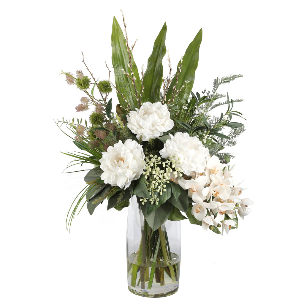 White Peony and Orchid Zen Artificial Arrangement with white peonies, white cymbidium orchids, banksia seed heads, tropical leaves, and mixed greenery in a tall glass cylinder vase