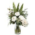 White Peony and Orchid Zen Artificial Arrangement with white peonies, white cymbidium orchids, banksia seed heads, tropical leaves, and mixed greenery in a tall glass cylinder vase