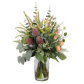 King Protea and Banksia Bush Artificial Arrangement with peach king protea, pink proteas, burgundy banksia cones, heliconia spikes, pampas grass, and native foliage in a tall glass cylinder vase