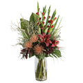 Red Gladiolus and Pincushion Protea Dramatic Artificial Arrangement with tall red gladioli, crimson oriental lilies, coral pincushion proteas, burgundy dahlias, and tropical foliage in a tall glass cylinder vase
