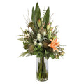 Peach Lily and Anemone Wild Garden Artificial Arrangement with peach oriental lilies, white anemones, white globe thistle, tan pincushion protea, and tropical foliage in a tall glass cylinder vase