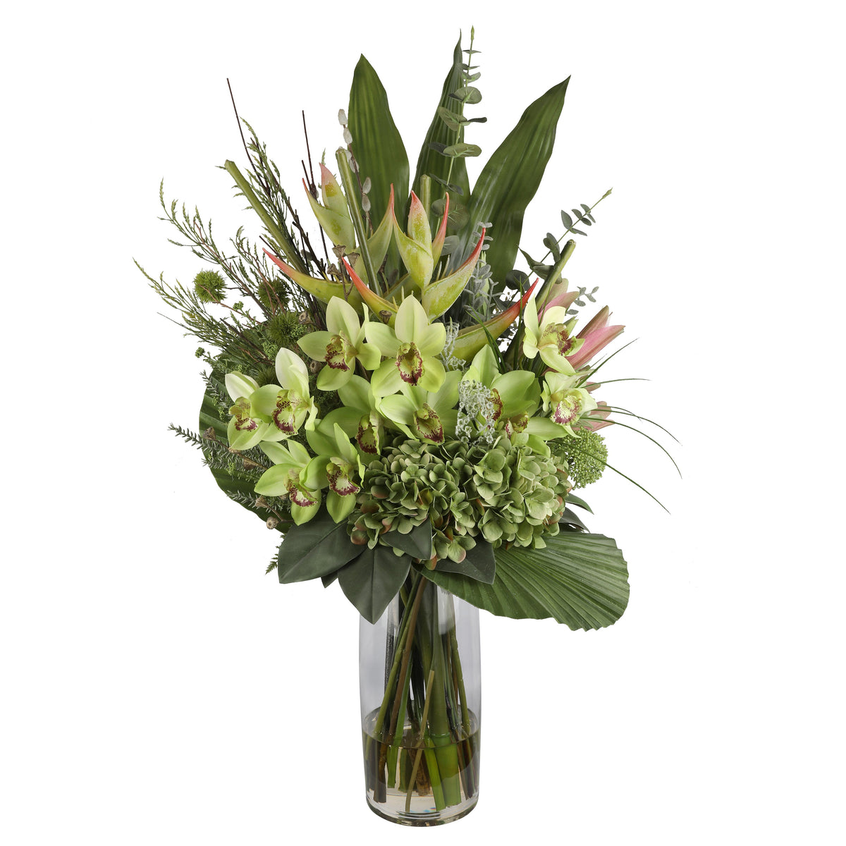 Green Cymbidium Orchid and Hydrangea Tropical Artificial Arrangement with green cymbidium orchids, green hydrangeas, pink protea buds, heliconia spikes, fan palm leaf, and tropical foliage in a tall glass cylinder vase