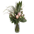 Blush Protea and Ranunculus Ethereal Artificial Arrangement with blush pink king protea, pink ranunculus buds, white oriental lilies, pink asters, and wild foliage in a tall glass cylinder vase