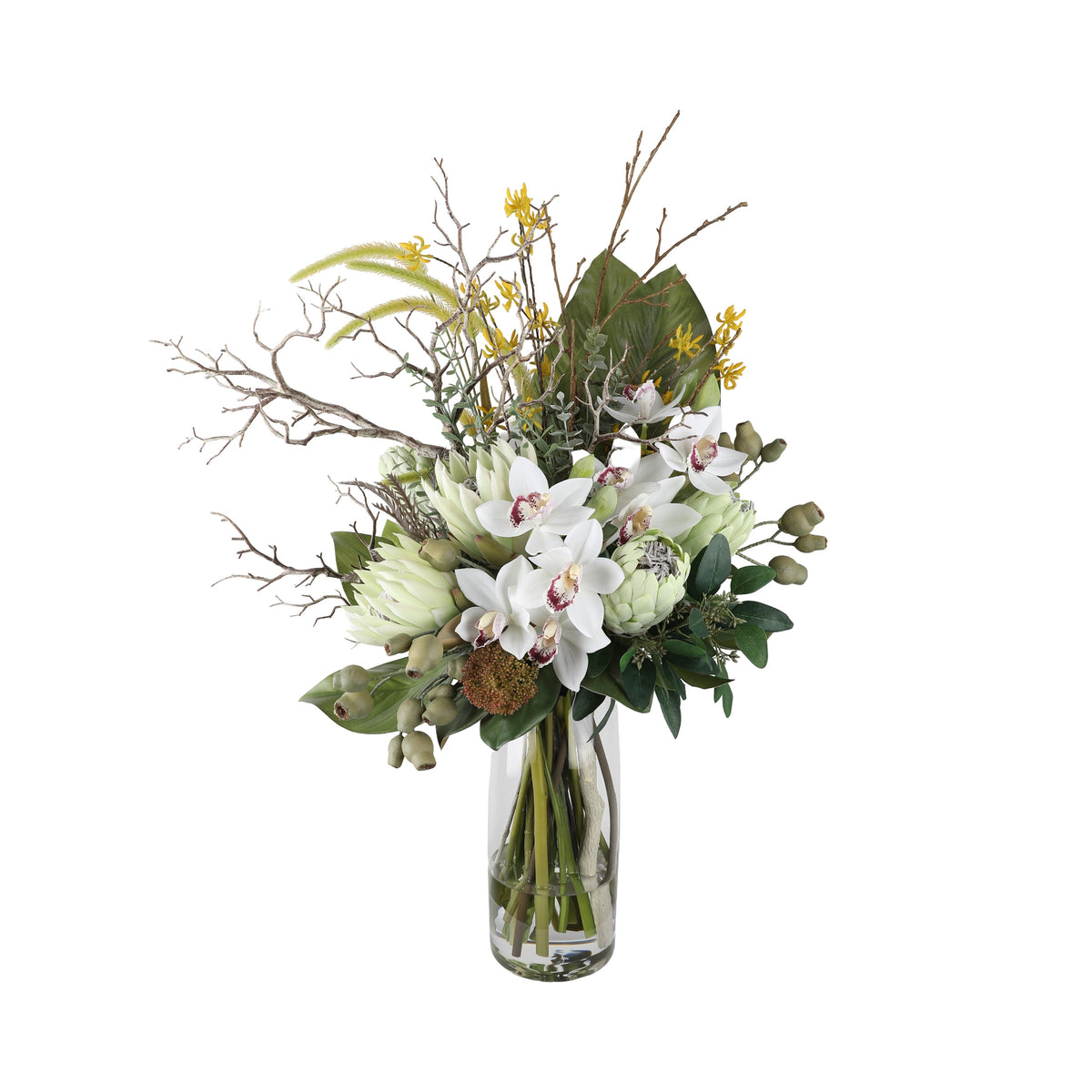 Bush Luxe Artificial Arrangement with white cymbidium orchids, white king proteas, green artichokes, yellow oncidium orchids, silver branches, and pampas grass in a tall glass cylinder vase