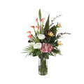 Pink Calla Lily and Protea Artificial Arrangement with tall pink calla lilies, white lisianthus, dusty pink hydrangea, yellow and pink proteas, and burgundy berries in a tall glass cylinder vase