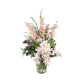 Blush Delphinium and Orchid Artificial Arrangement with tall pink delphiniums, white and blush cymbidium orchids, green hydrangea, burgundy leaves, and ferns in a tall glass cylinder vase