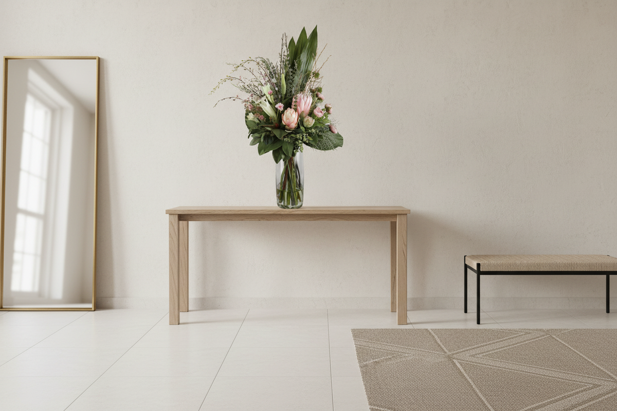 Blush Protea and Ranunculus Ethereal artificial arrangement in a neutral entryway