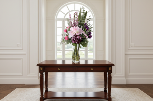 Purple Reign large artificial arrangement on a grand entryway console, grounded in a tall glass cylinder vase, 90 x 40 cm
